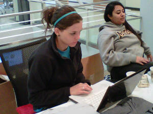 On Tuesday Nov. 8, 2011 Junior Kayla Blevins sells T-shirts for AAF Mizzou.